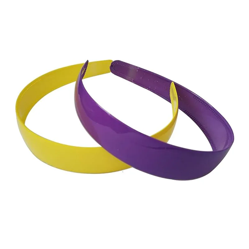 Hur kan ett hårband i enfärgad plast för kvinnor lyfta vardagens stil med enkel elegans